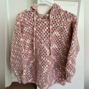 Nice and warm hand-knitted hooded jacket.